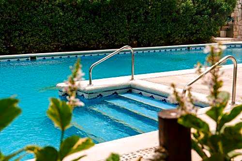 Petit Lafitte Beach Front Hotel & Bungalows