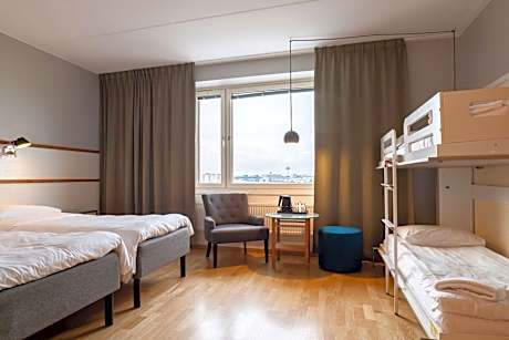 Family Room with Two Single Beds and One Sofa Bed