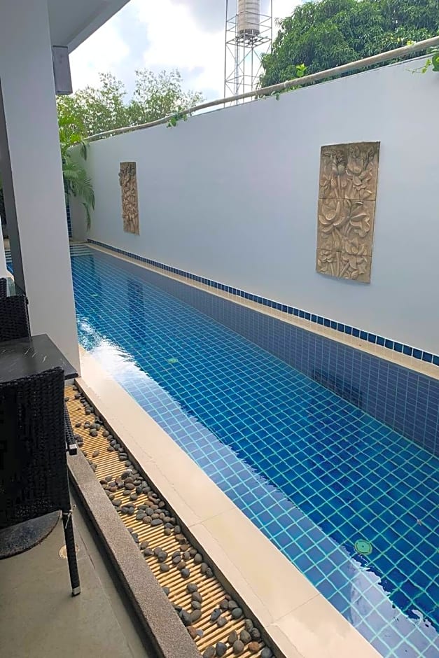 One World One Home Naiharn Hotel