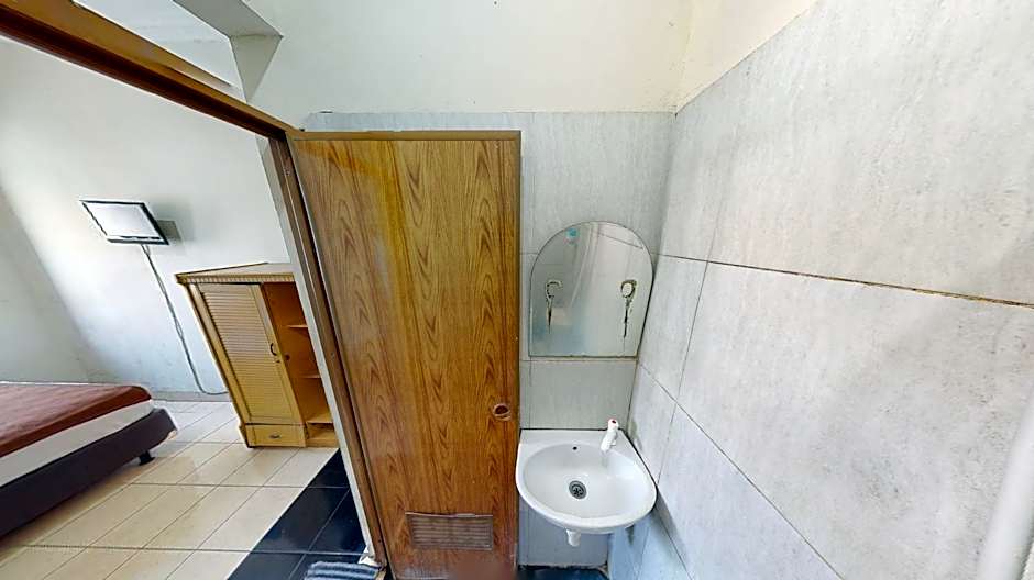 Unique Guesthouse 1 Pasar Baru