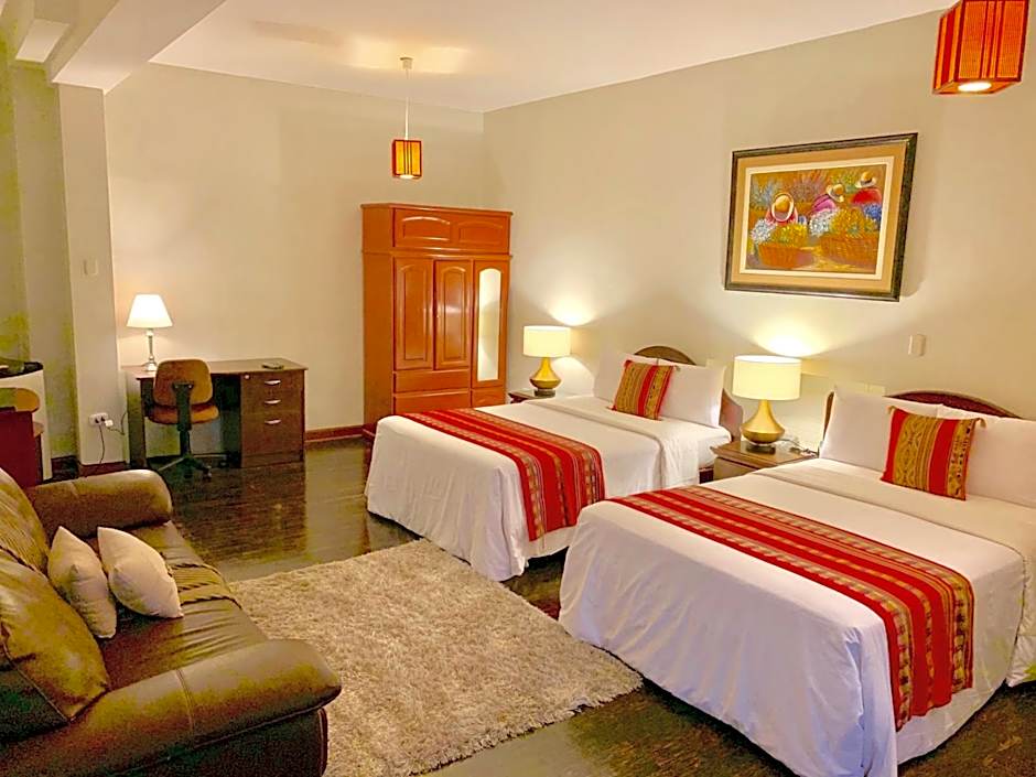 Photo 1 of 7 of Quadruple Room