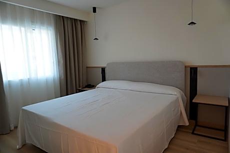 Triple Room (2 Adults + 1 Child)