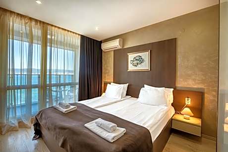 One-Bedroom Apartment with Sea View