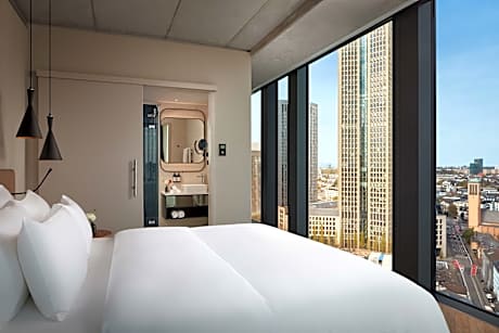 Family Adjoining Room (3 Adults + 1 Child)