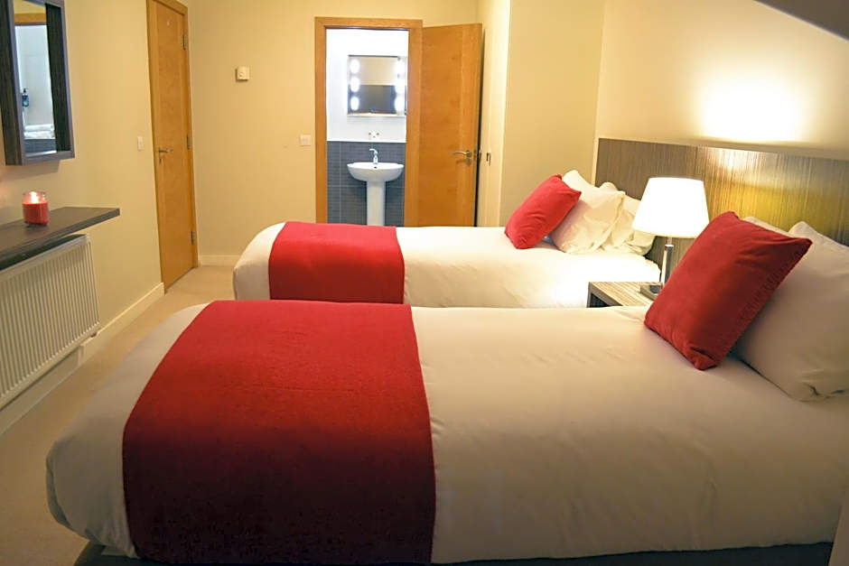 Carrick Plaza Suites and Apartments