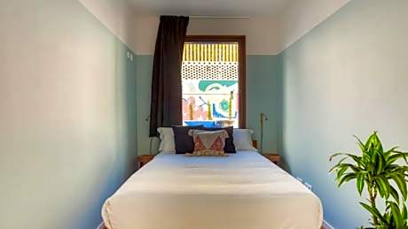 Compact Room - Double Bed with Shared Bathroom