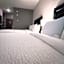 Grander Inn & Suites by IHG