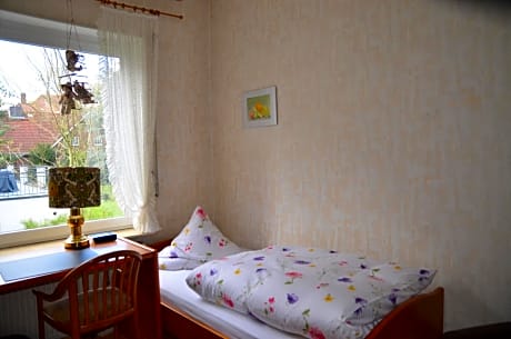 Single Room with toilet and shared bathroom
