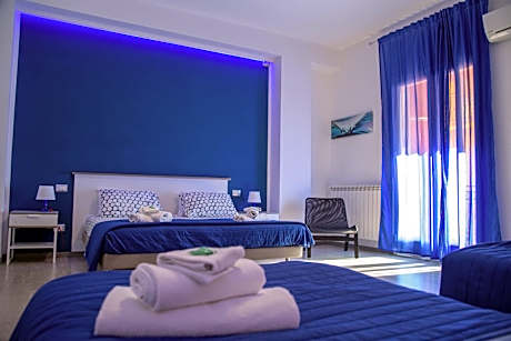 Quadruple Room with Private Bathroom