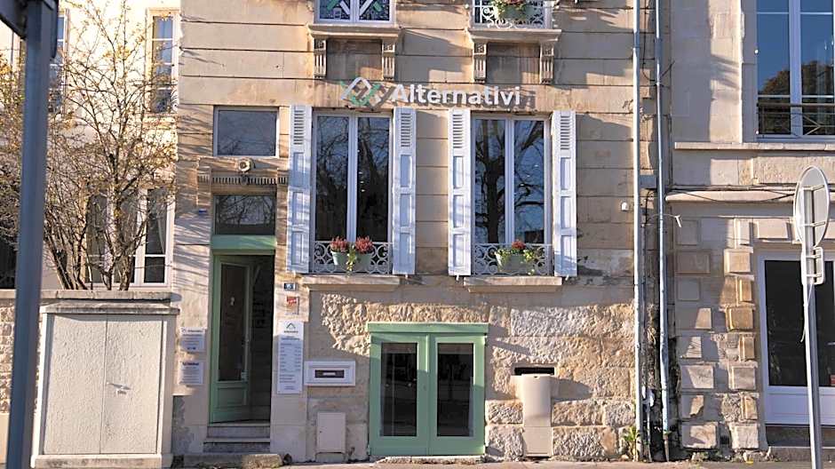 Chambres au coeur du quartier historique - Maison Alternativi