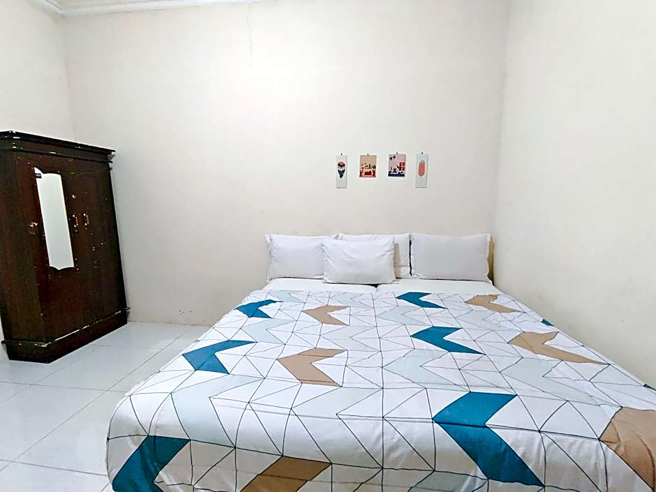 Homey Guesthouse near Sby Zoo (Syariah) 