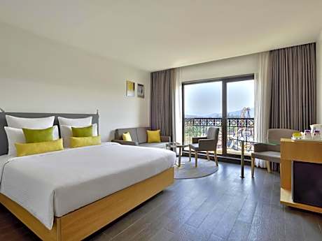 Deluxe King Room with Sofa Bed with Complimentary one free ticket for Trampoline Park at Imagicaa per room per stay and 20% discount on Food and Beverage