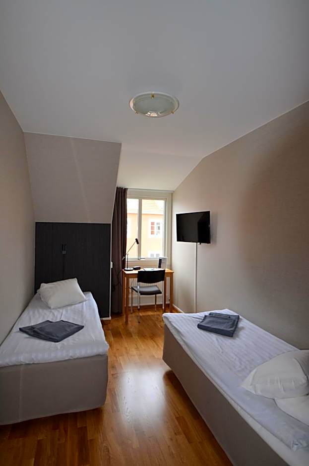 Photo 1 of 12 of Economy Twin Room with Shared Bathroom