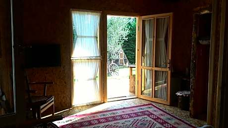 Wooden Bungalow with Garden View