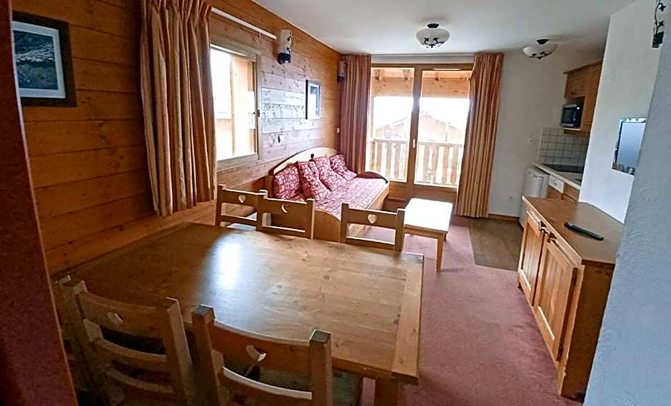 Vacancéole - Résidence Les Chalets de la Ramoure