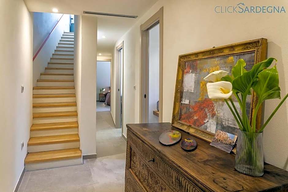 ClickSardinia Alghero Spectacular waterfront Neptune apartment with sea-facing terraces and garden