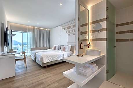 Superior twin room with balcony and sea views- 2single beds and single sofa