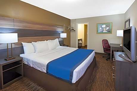 1 King Bed and 2 Double Beds Suite Non-Smoking