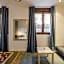 Apt with Antique Floor & lots of Sun Light