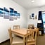 Beach House Inn & Suites