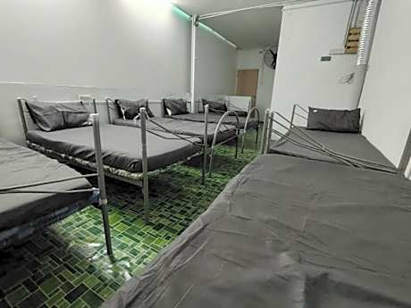 Single Bed in Dormitory Room