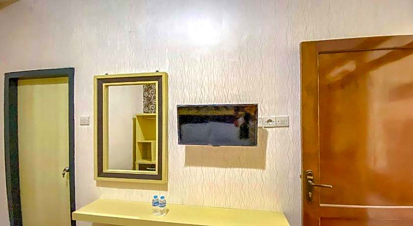 Tini's Guest House Malang Mitra RedDoorz