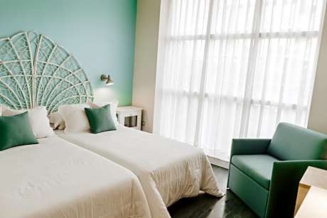 Triple Room (2 Adults + 1 Child)