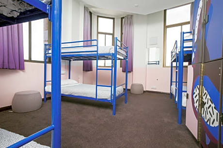 Bed in 4-Bed Male Dormitory Room with Shared Bathroom