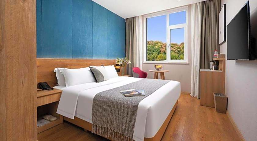 New Beacon Sunyee SPA Hotel