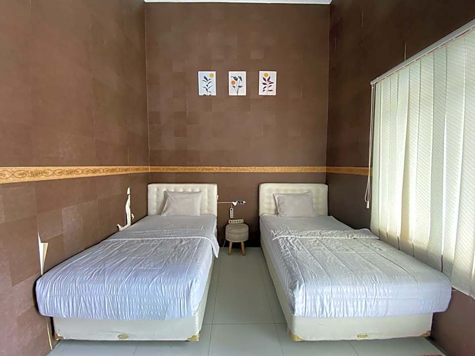 Griya RW Family Guest House Redpartner