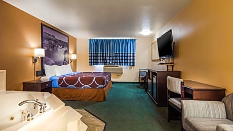 Suite-1 King Bed  Non-Smoking, Jetted Tub, Microwave And Refrigerator, Walk In Shower, Full Breakfast
