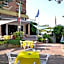 Hotel Boomerang - Check-in & Meals in front at hotel Sporting