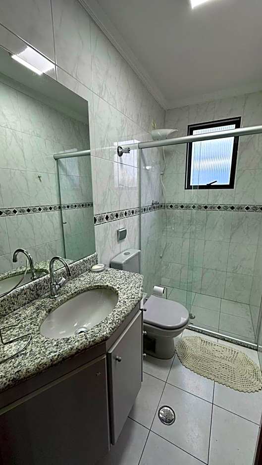 Belo apartamento de frente ao mar - Vila Caiçara