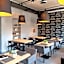 Qbatura Cafe & Hotel