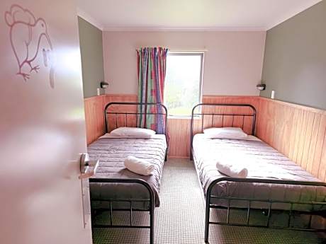 Single Bed in Dormitory Room