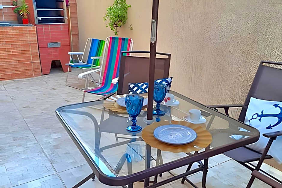 Studio pé na areia com área de churrasco privativa