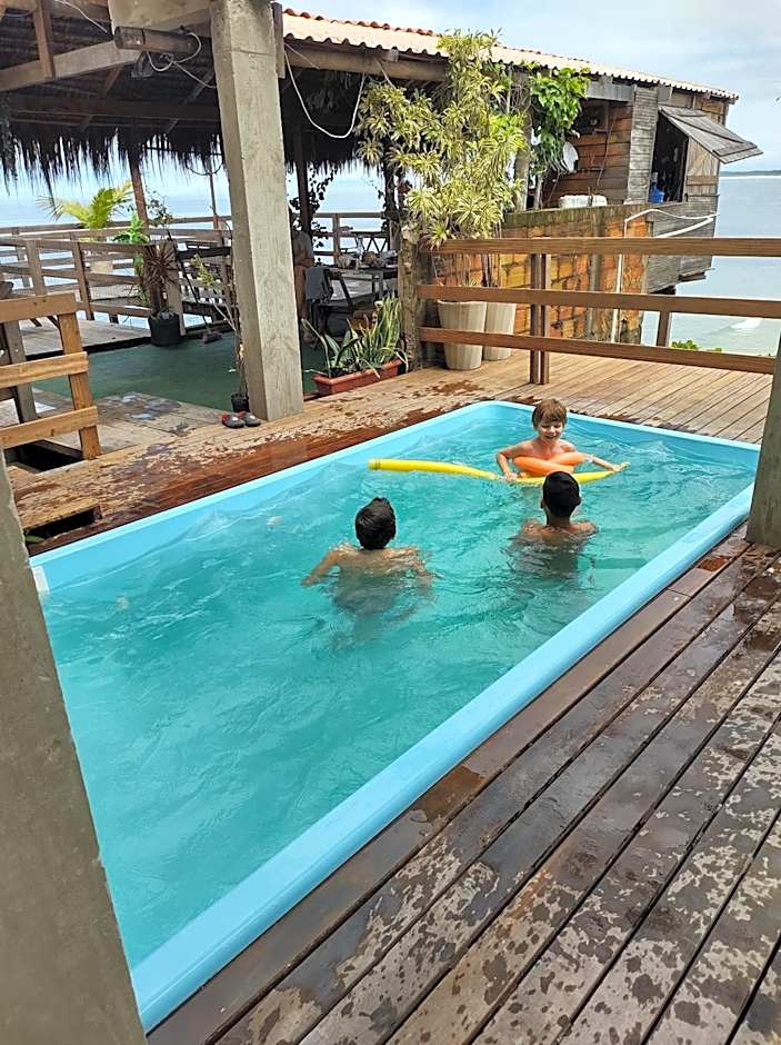 Pousada Marambaia Café - Praiana, econômica, Com café da manhã, piscina ao ar livre e hidromassagem aquecida -Frente para o mar