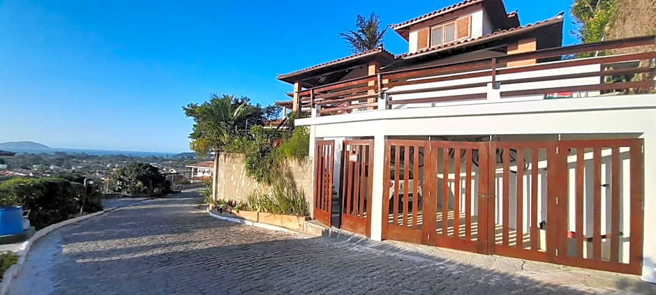 3Suítes, piscina e vista do mar em condomínio pé na areia - pátio compartilhado