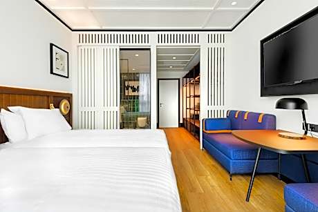 Triple Room (2 Adults + 1 Child)