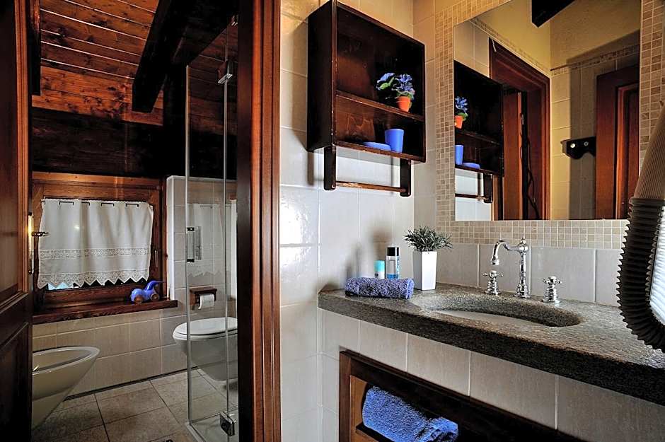 Aparthotel Foyer d'antan SUITE con caminetto hammam o vasca idromassaggio