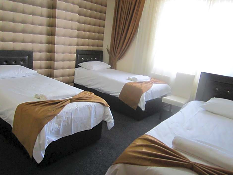 Photo 1 of 2 of Triple Room