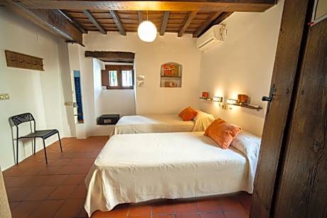 Single Bed in Dormitory Room