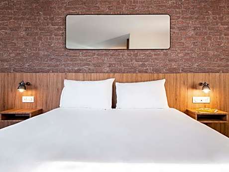 Family Suite with a double bed and a double sofa bed