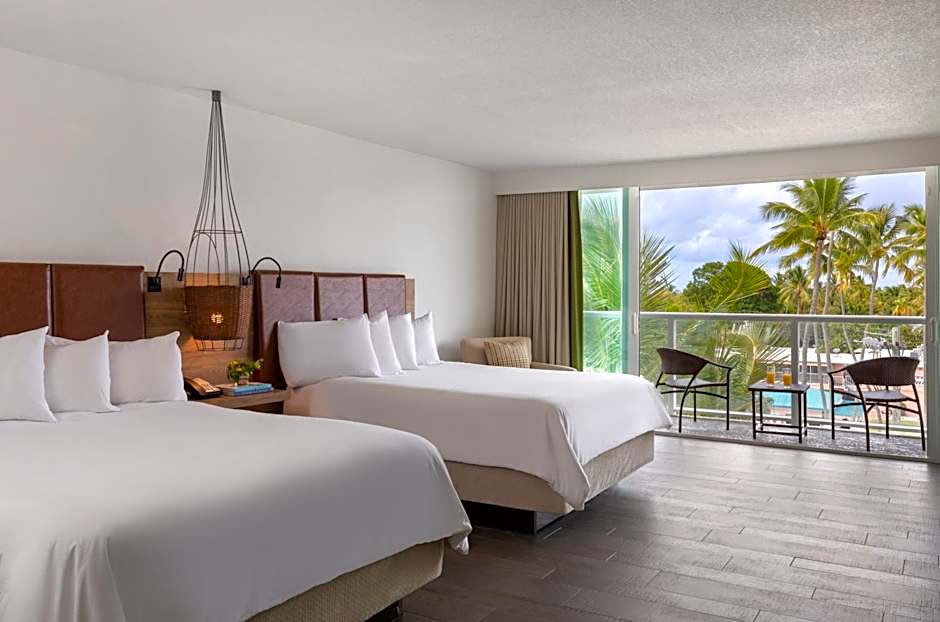 Photo 1 of 4 of 2 Queen Beds, Partial Ocean View