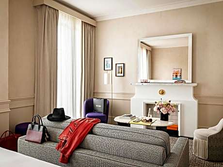 Junior King Suite with One King Bed/One Sofa Bed and Living Room - Courtyard or Rue Scribe View