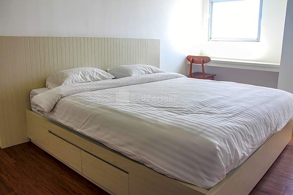 RedLiving Apartemen Gunung Putri Square - Abidin Room Tower Pinus