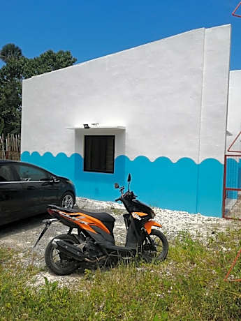 Bluewaves Apartment, scooter, car
