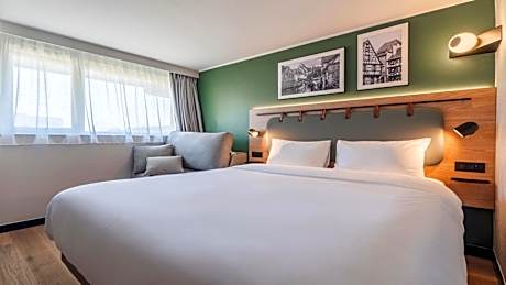 Standard Room with One Queen Bed and One Sofa Bed