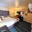 Bluebird Day Inn & Suites