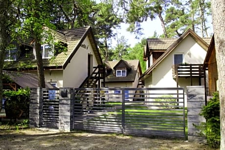 Sztil - Apartamenty i drewniane domki